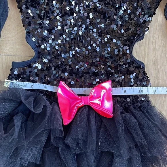 Dance costume competitive, parade sporting events. Black & pink sequin romper